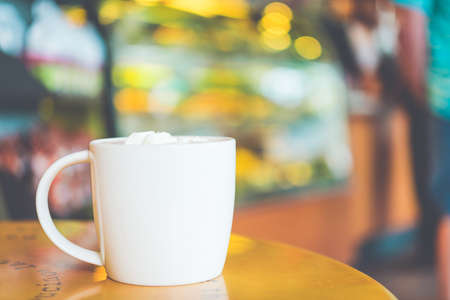 Coffee cup in coffee shop - vintage effect style pictureの写真素材