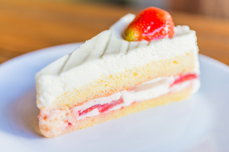 Strawberry cream cakes on white plateの写真素材
