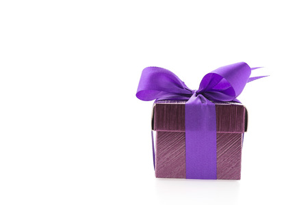 Purple gift box isolated on white backgroundの写真素材