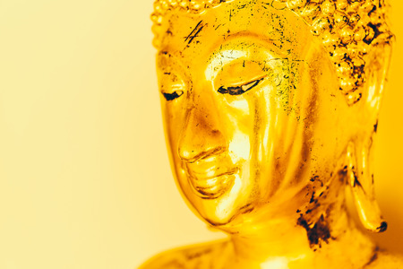 Selective focus Buddha face background - vintage effect style picturesの写真素材