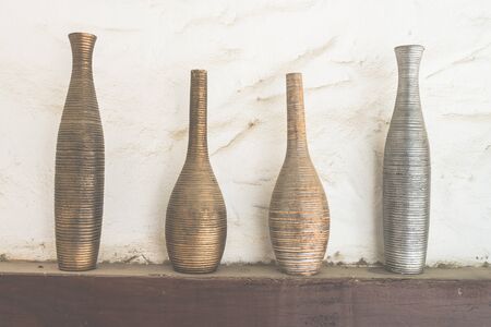 Vase derocation on wall - vintage effect style picturesの写真素材