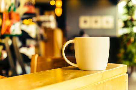 Coffee mug in coffee shop cafe - Vintage effect style picturesの写真素材