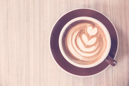 Latte coffee cup - vintage filterの写真素材