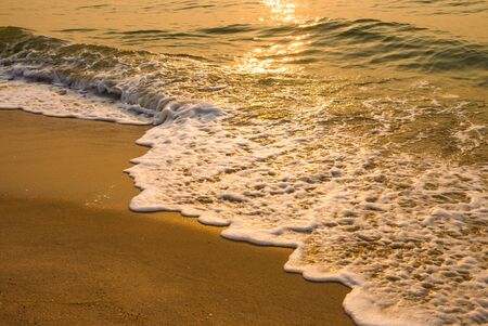 Sea water and sun flare - vintage filterの写真素材
