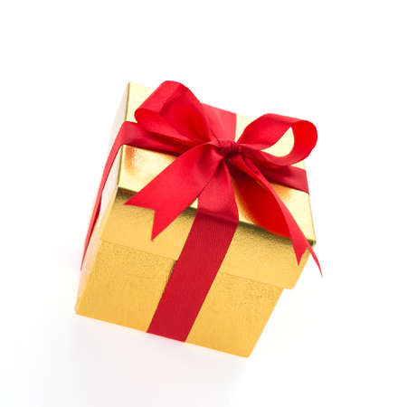 Christmas gold gift box isolated on white background