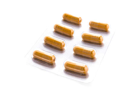 Capsule pill isolated on white backgroundの写真素材