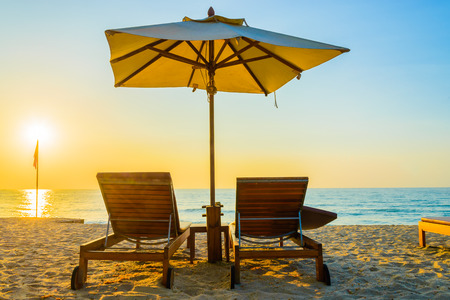 Beach bed with sun flare twilight timeの写真素材