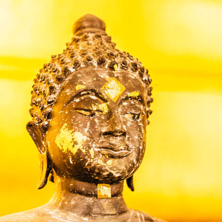 Selective focus Buddha face background - vintage effect style picturesの写真素材