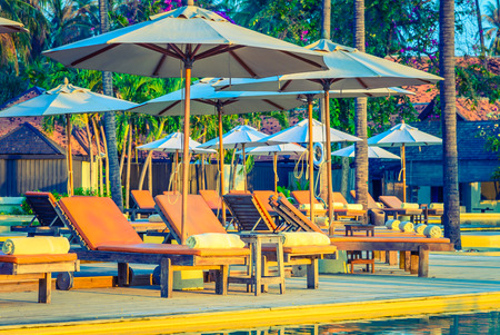 Bed pool deck with sunrise on twilight time - vintage filter effectのeditorial素材