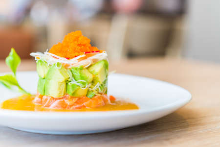 Tartar salmon with avocado salad - japanese food styleの写真素材