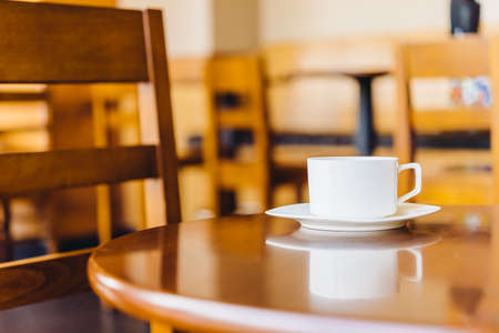 Coffee cup in coffee shop - vintage effectの写真素材