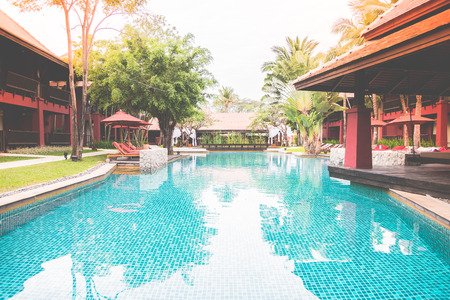 Hotel swimming pool resort - vintage film tone effect and light leak filter processing styleのeditorial素材