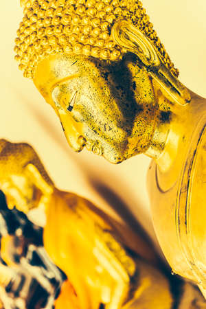 Selective focus Buddha face background - vintage effect style picturesの写真素材