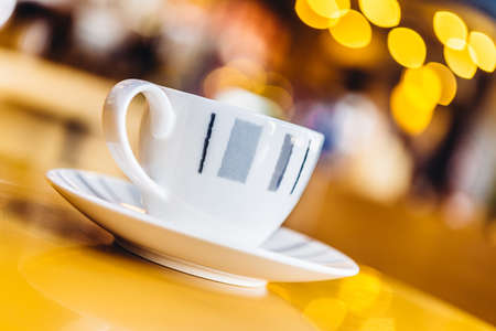 Coffee cup on wood table - vintage effect style picturesの写真素材