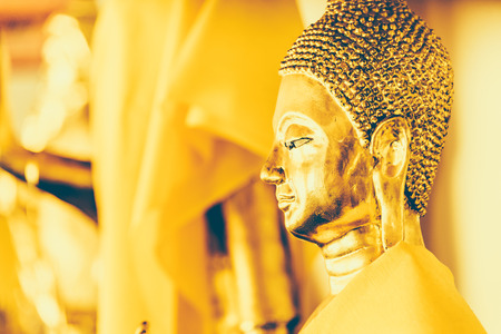 Selective focus point on Buddha statue in wat arun from thailand bangkok - vintage effect style picturesの写真素材