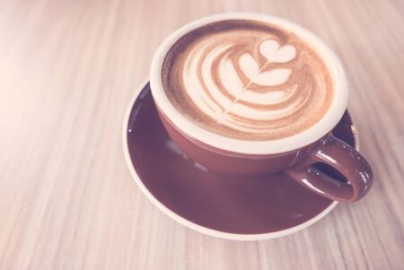 Latte coffee cup - vintage filterの写真素材