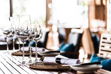 Selectiv soft focus on Wine glass on dining table in restaurantの写真素材