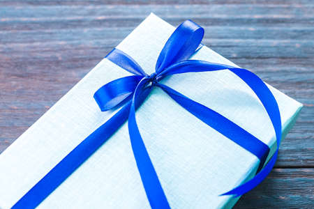 Gift box on wood background - vintage effect style picturesの写真素材