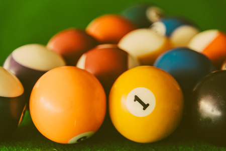 Pool billiards balls on pool table - vintage filter