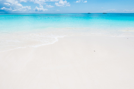 Beautiful tropical summer beach and sea with blue sky - summer vacation using as background