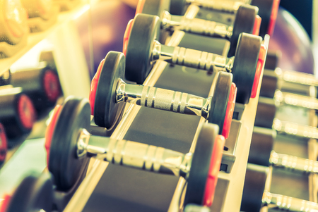 Dumbbell selective focus point - vintage filter and sun flare effectの写真素材