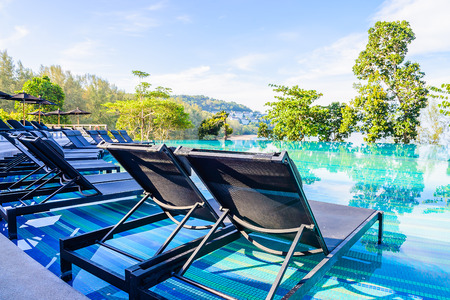 Umbrella pool chair on roof top