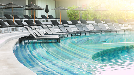 Chair in hotel poolの写真素材