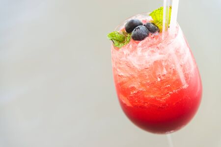 Red berry fruit ice cocktails glass - non alcoholの写真素材
