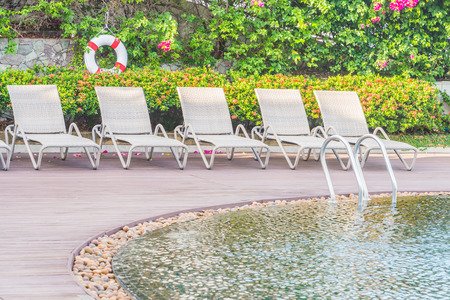Pool chair with umbrellaの写真素材