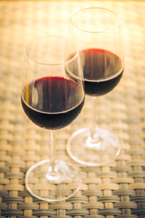 Red Wine glass for dinner - vintage filterの写真素材