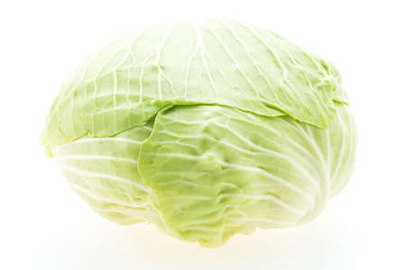 Green cabbage vegetable isolated on white backgroundの写真素材