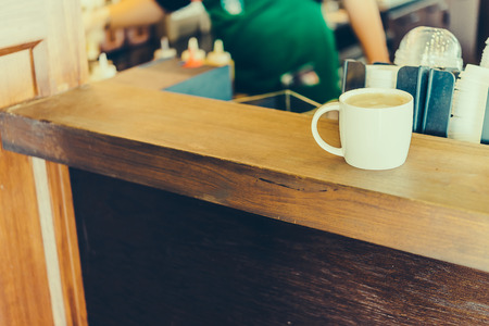 latte coffee in white cup - vintage effect style picturesの写真素材