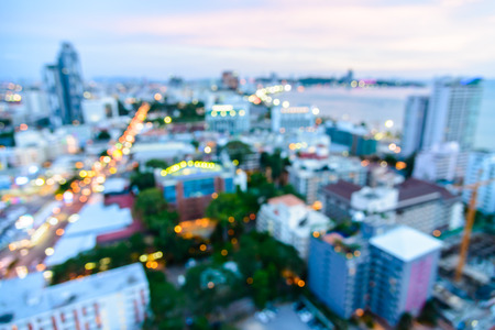 Abstract blur pattaya city background on twilight times - shift white balance processingの写真素材