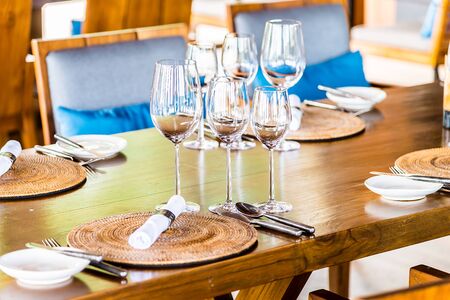 Selectiv soft focus on Wine glass on dining table in restaurantの写真素材