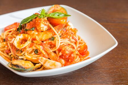 Spaghetti seafood with tomato sauce  , italian foodの写真素材