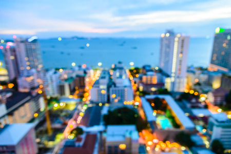 Abstract blur pattaya city background on twilight times - shift white balance processingの写真素材