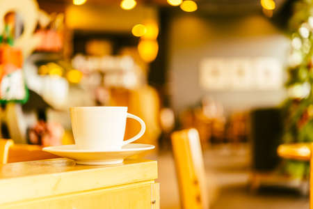 Coffee mug in coffee shop cafe - Vintage effect style picturesの写真素材