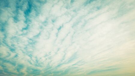Cloud on blue sky - vintage filterの写真素材
