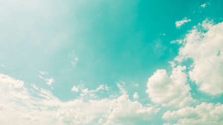 Vintage cloud on blue sky - vintage filter effectの写真素材