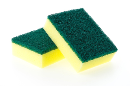 Sponge dish isolated on white backgroundの写真素材