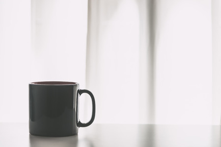 Selective focus on Black Coffee cup - vintage soft filterの写真素材