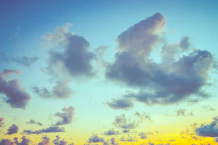 Sunset time on cloud and sky - vintage filterの写真素材