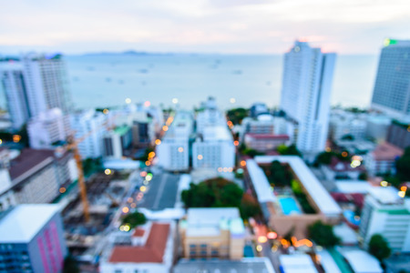 Abstract blur pattaya city background on twilight times - shift white balance processingの写真素材