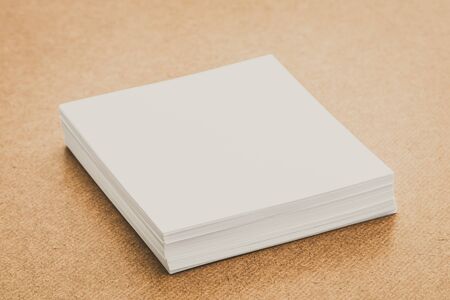 White paper mock up on wood background - vintage filterの写真素材