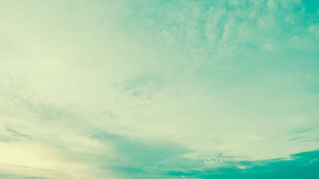 White cloud on blue sky - vintage filter effectの写真素材