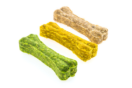 Colorful dog bones food isolated on white backgroundの写真素材