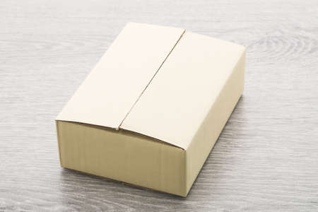 Paper box on wood backgroundの写真素材