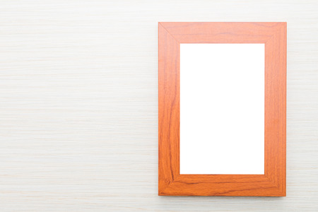Photo frame on wooden backgroundの写真素材