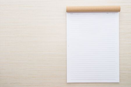 White paper mock up on wood background