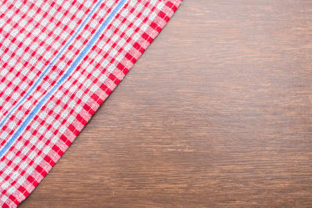 Tablecloth on wooden background with copy spaceの写真素材